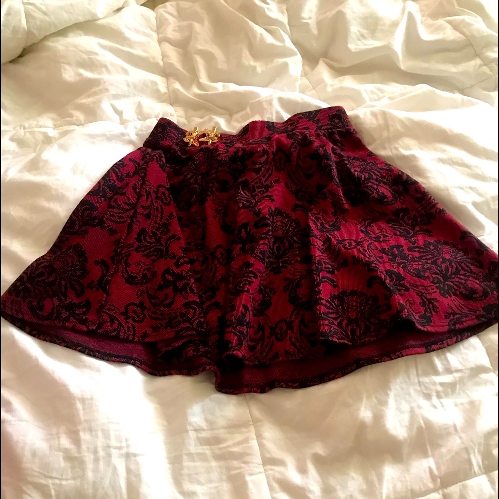 Crimson skirt with black details